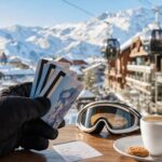 Skipassy i paragon na stoliku w kurorcie narciarskim w Szwajcarii, w tle ośnieżone stoki.